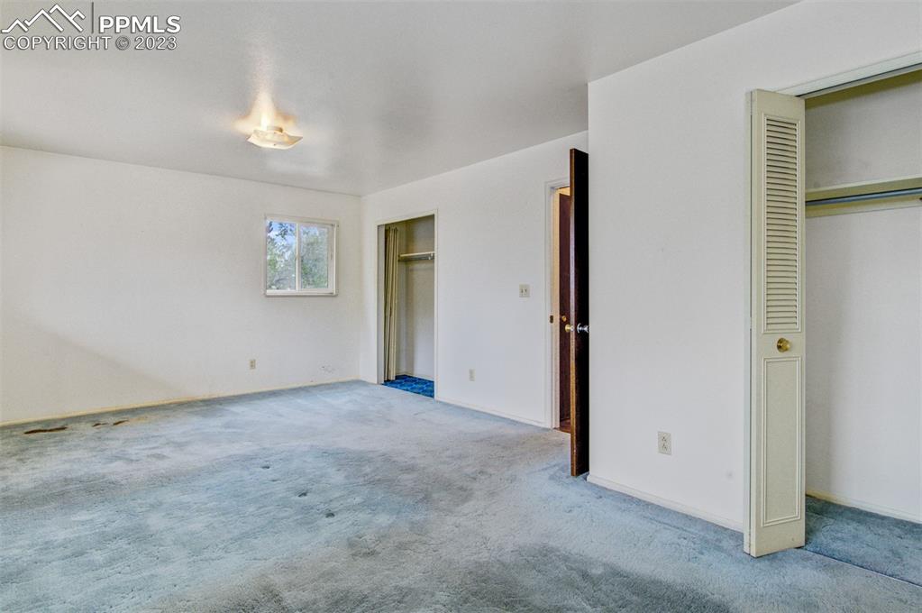 5380 Babcock Court Colorado Springs, CO 80915 - Photo 9 of 28 a view of an empty room with a window