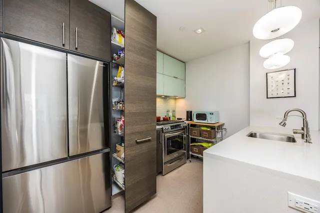 a living room with furniture a dining table and chairs