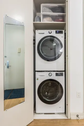 a kitchen with refrigerator and window