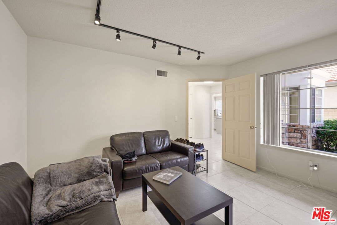 12119 Falcon Crest Way Porter Ranch, CA 91326 - Photo 21 of 51 a living room with furniture