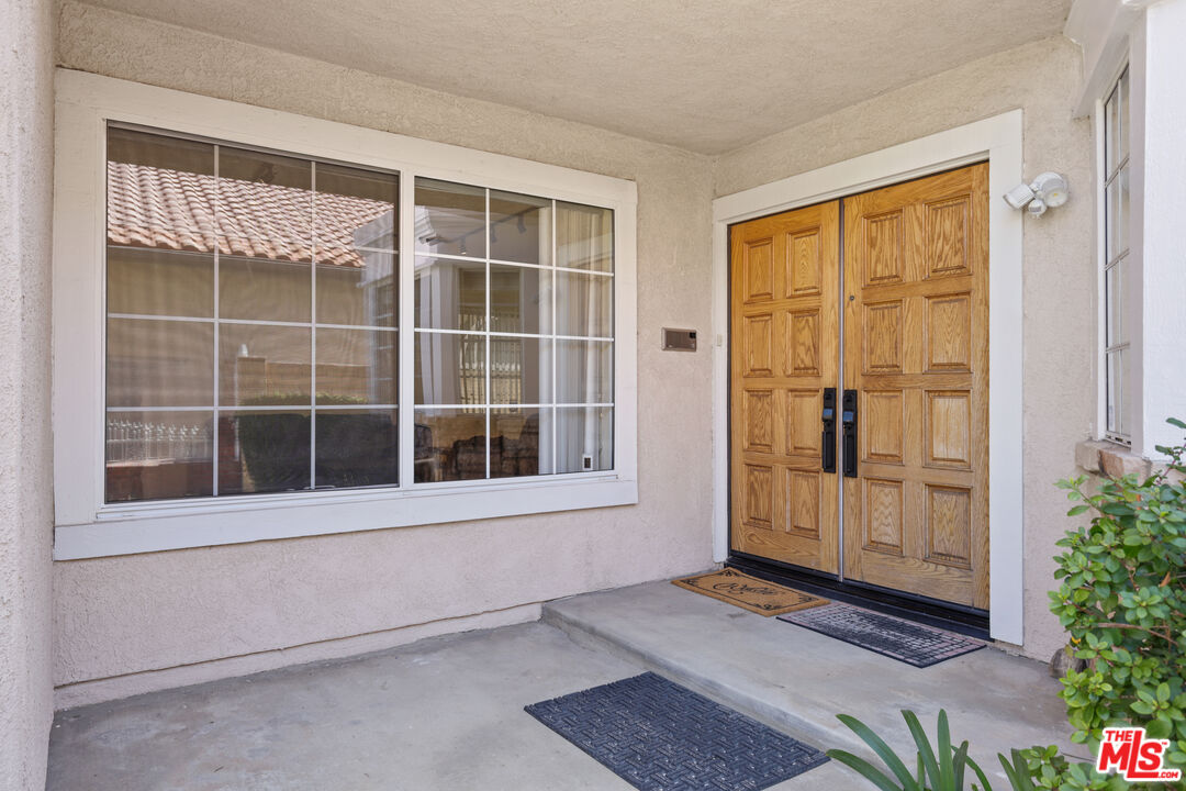 12119 Falcon Crest Way Porter Ranch, CA 91326 - Photo 5 of 51 a view of front door