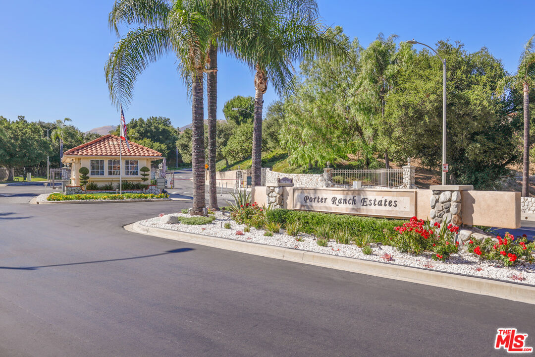 12119 Falcon Crest Way Porter Ranch, CA 91326 - Photo 51 of 51 a view of a house with a yard and potted plants