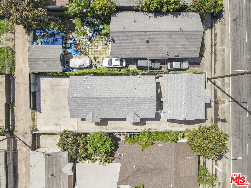1256 Exposition Boulevard Los Angeles, CA 90007 - Photo 24 of 28 an aerial view of a house with a yard and garden