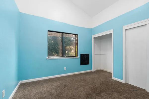 an empty room with window