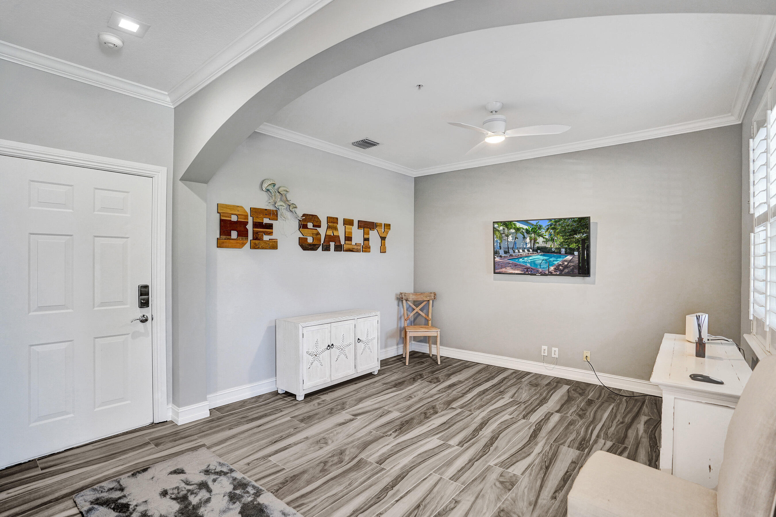 314 Northwest 1st Street Delray Beach, FL 33444 - Photo 21 of 26 a view of a room with wooden floor and window