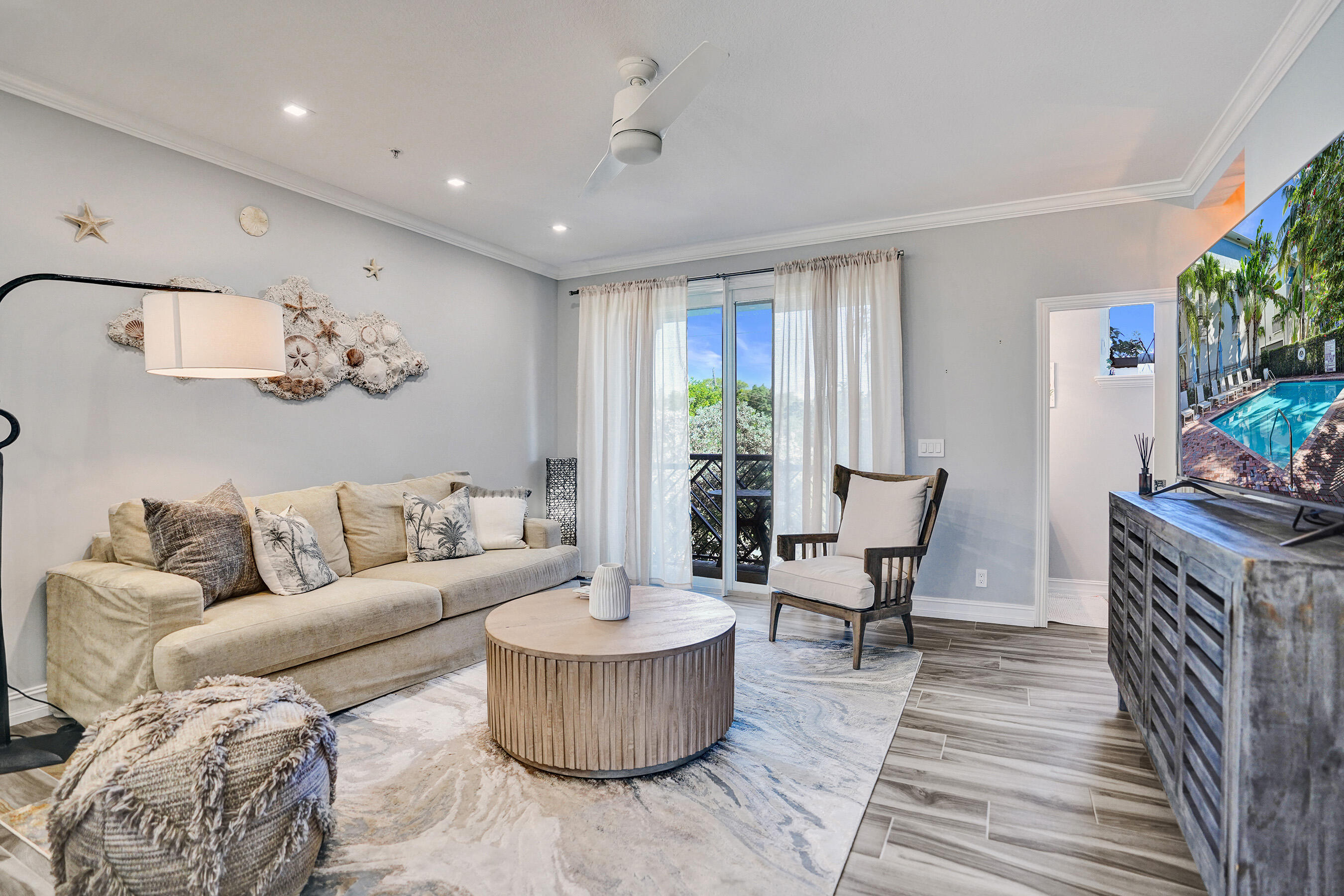 314 Northwest 1st Street Delray Beach, FL 33444 - Photo 6 of 26 a living room with furniture and a potted plant