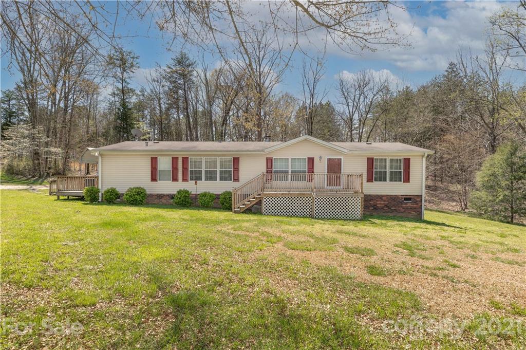 1465 Humphries Road Clover, SC 29710 - Photo 1 of 47 a house view with a garden space