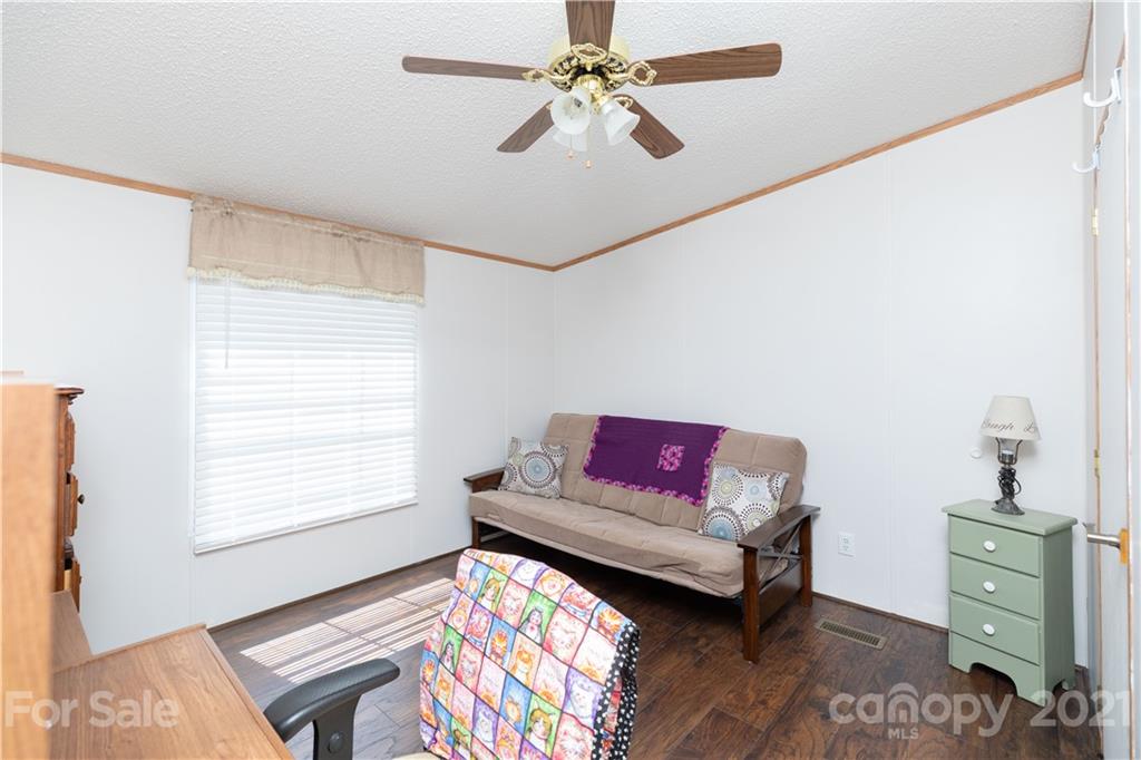 1465 Humphries Road Clover, SC 29710 - Photo 22 of 47 a living room with furniture and a window