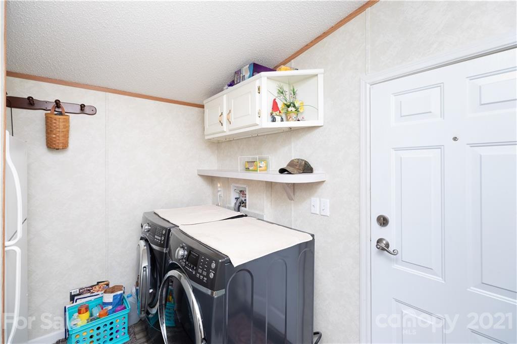 1465 Humphries Road Clover, SC 29710 - Photo 23 of 47 a utility room with dryer and washer