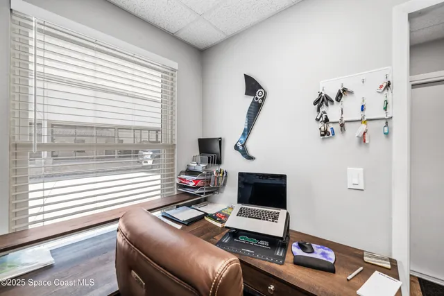 a room with furniture and a window