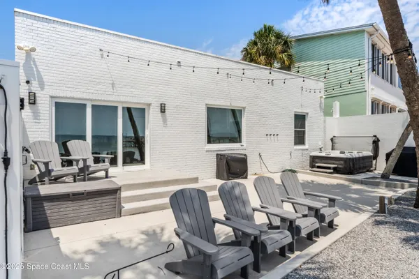 a view of a dinning room and kitchen with furniture