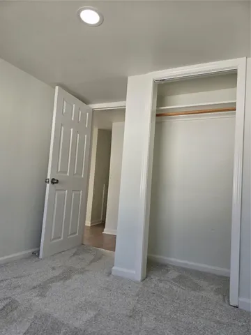 an empty room with a door