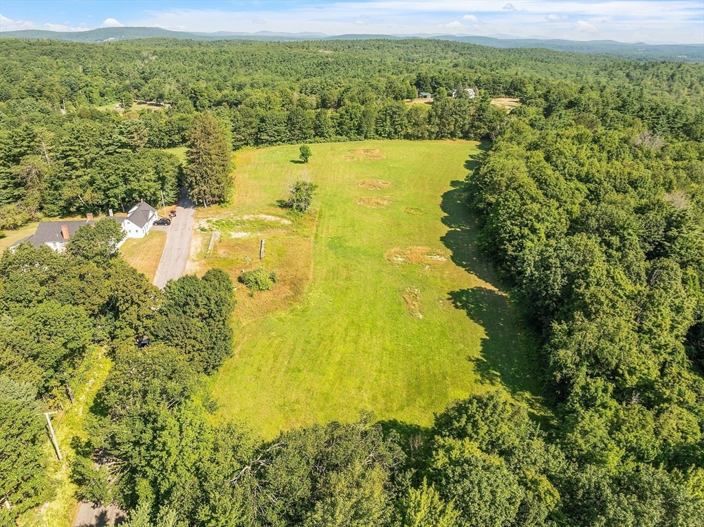Lot 7 Old Northfield Road Ashby, MA 01431 - Photo 14 of 18 a view of a lake with a city view