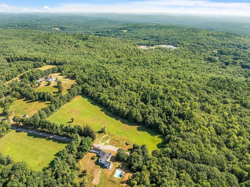 Lot 7 Old Northfield Road Ashby, MA 01431 - Photo 3 of 18 a view of a lake with a yard