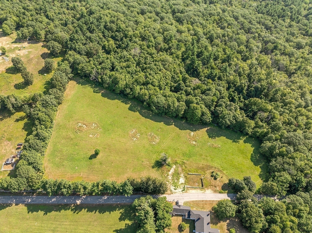 Lot 7 Old Northfield Road Ashby, MA 01431 - Photo 4 of 18 an aerial view of residential houses with outdoor space and swimming pool