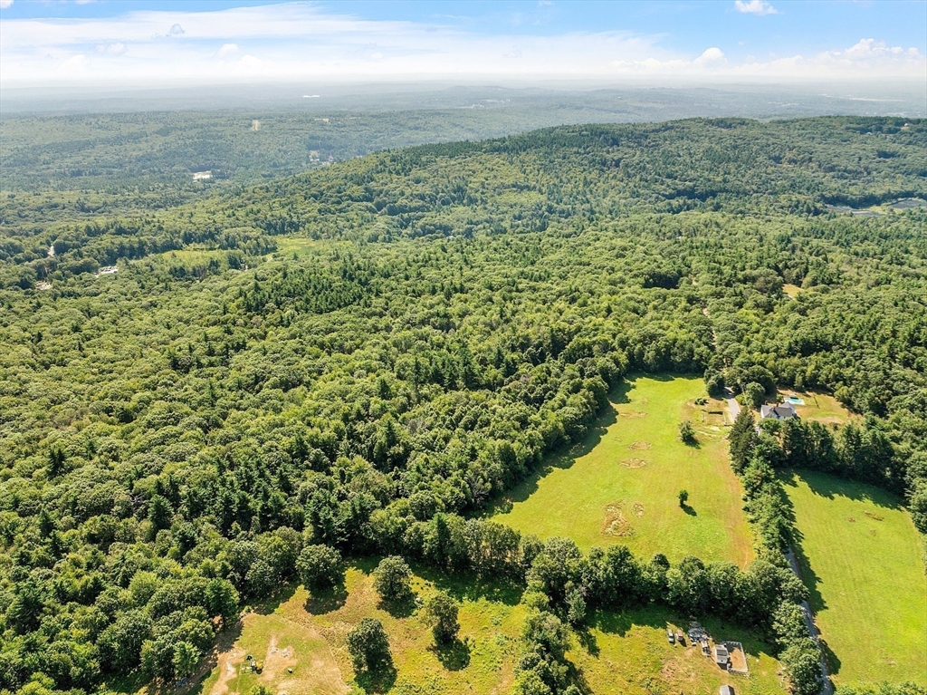 Lot 7 Old Northfield Road Ashby, MA 01431 - Photo 5 of 18 an aerial view of residential houses with outdoor space