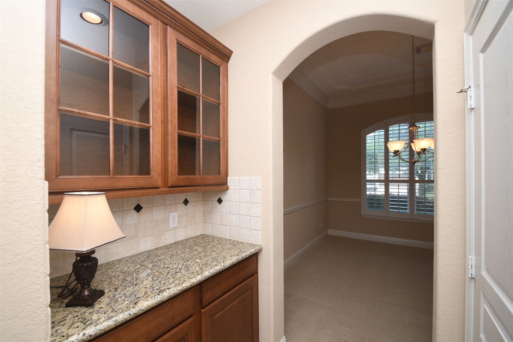 5803 Oakdale Meadows Spring, TX 77379 - Photo 13 of 21 a kitchen with a granite countertop sink and cabinets