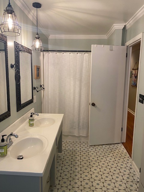 796 Dripping Springs Road Winchester, TN 37398 - Photo 22 of 34 a bathroom with a sink a mirror and a shower
