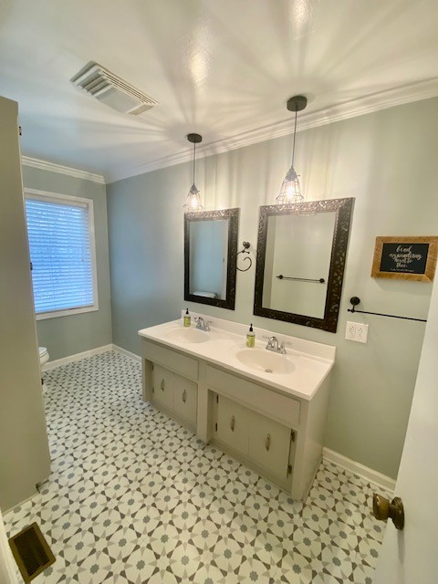 796 Dripping Springs Road Winchester, TN 37398 - Photo 23 of 34 a bathroom with a sink toilet and mirror