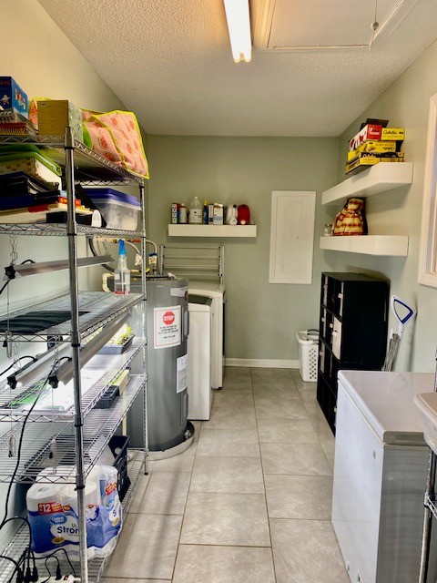 796 Dripping Springs Road Winchester, TN 37398 - Photo 26 of 34 a utility room with cabinets dryer and washer
