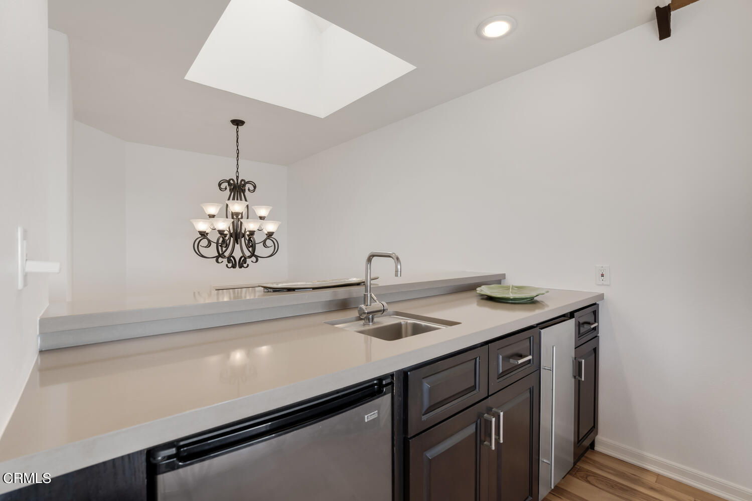 3817 Ocean Drive Oxnard, CA 93035 - Photo 20 of 51 a view of a room with a sink and chandelier