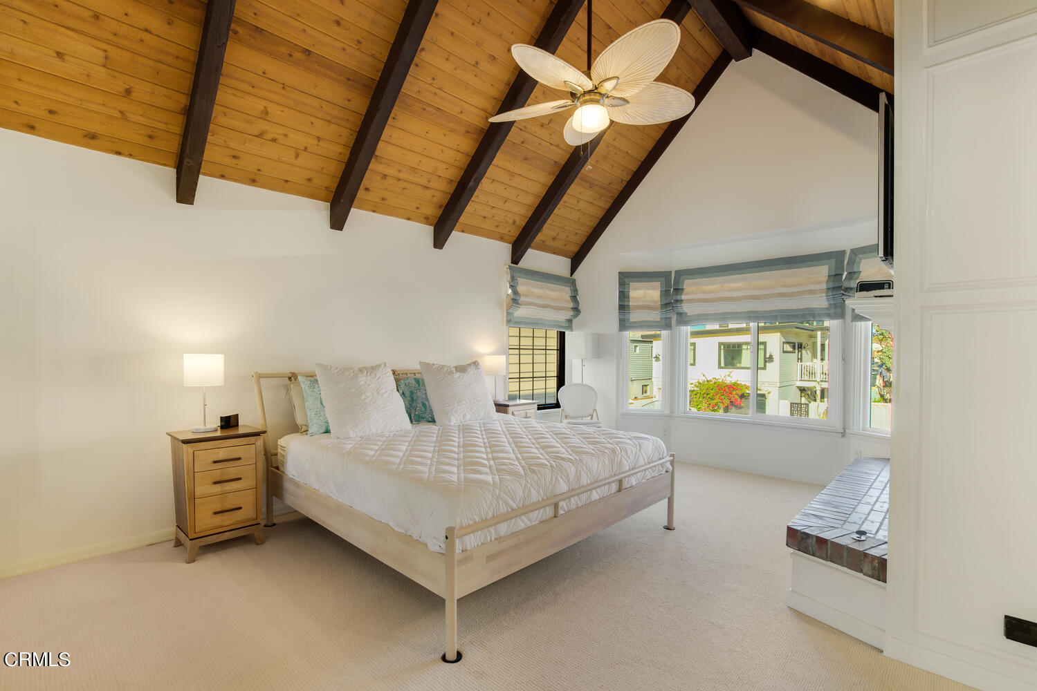 3817 Ocean Drive Oxnard, CA 93035 - Photo 25 of 51 a bedroom with a bed next to a window with outer view