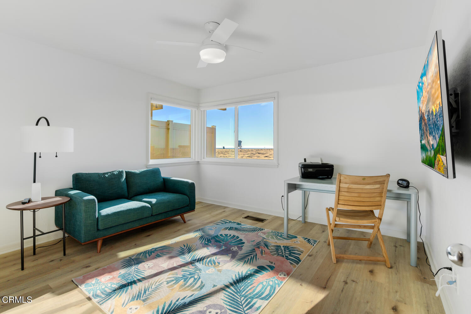 3817 Ocean Drive Oxnard, CA 93035 - Photo 30 of 51 a living room with furniture and a flat screen tv