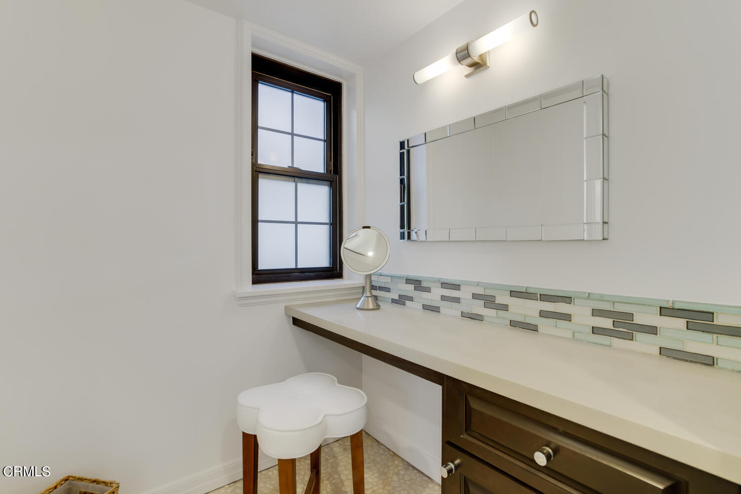 3817 Ocean Drive Oxnard, CA 93035 - Photo 31 of 51 a bathroom with a sink and a mirror