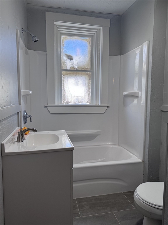 36 Endicott Street, Unit 1R Salem, MA 01970 - Photo 7 of 9 a bathroom with a sink toilet and shower