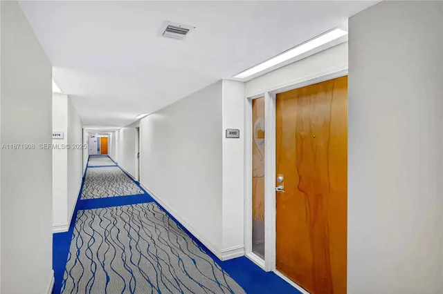 a swimming pool with outdoor seating and yard