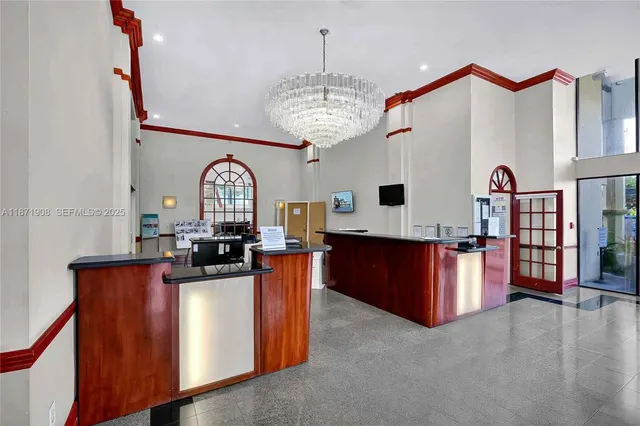 a reading room with furniture and wooden floor