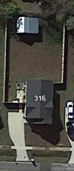 a view of a fireplace with wooden floor