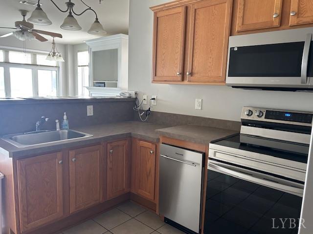 1273 Graves Harbor Trail, Unit 318 Huddleston, VA 24104 - Photo 12 of 21 a kitchen with stainless steel appliances granite countertop a sink and a microwave