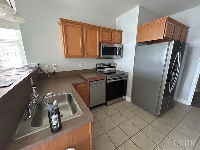 1273 Graves Harbor Trail, Unit 318 Huddleston, VA 24104 - Photo 14 of 21 a kitchen with a sink appliances and cabinets