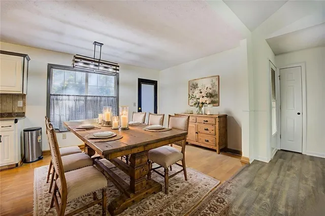 a view of a kitchen with furniture and a kitchen