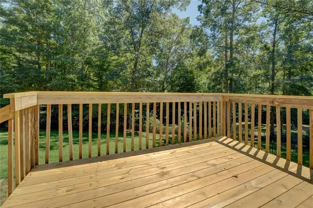 a balcony with wooden floor