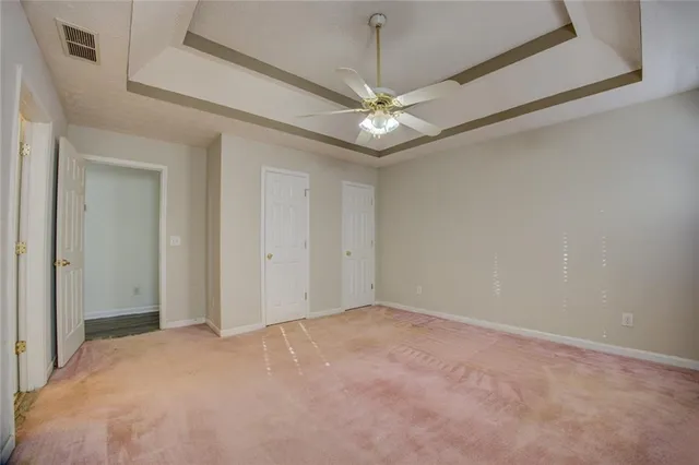 a view of a room with a dishwasher and a window