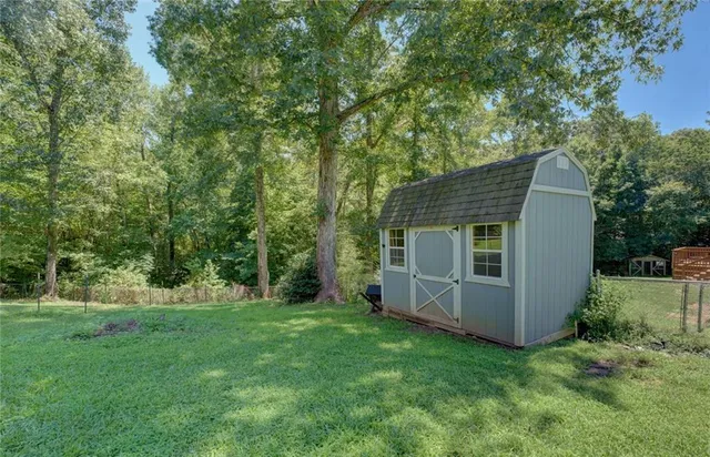 a view of a park with a tree
