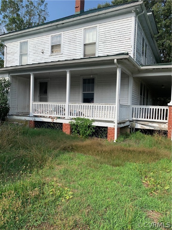 4762 Three Chopt Road Louisa, VA 23093 - Photo 1 of 6 a view of a house with a yard and deck