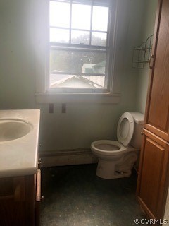 4762 Three Chopt Road Louisa, VA 23093 - Photo 2 of 6 a bathroom with a toilet a sink and a window
