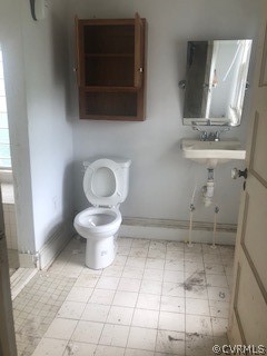 4762 Three Chopt Road Louisa, VA 23093 - Photo 5 of 6 a bathroom with a toilet and a mirror