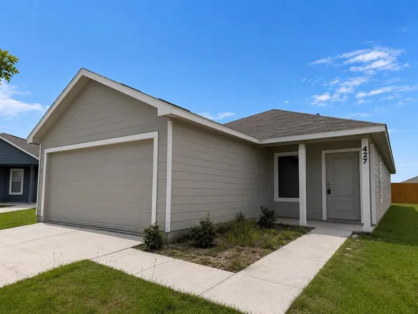 a front view of house with yard