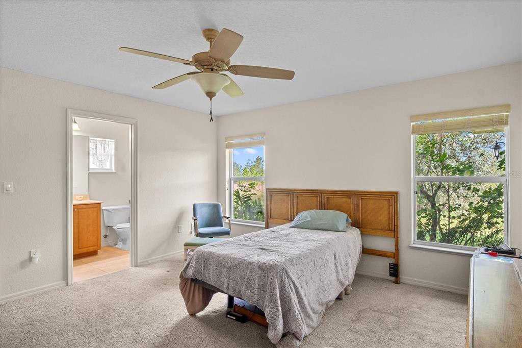 30 Milky Way Venus, FL 33960 - Photo 16 of 45 a bedroom with a bed and a window