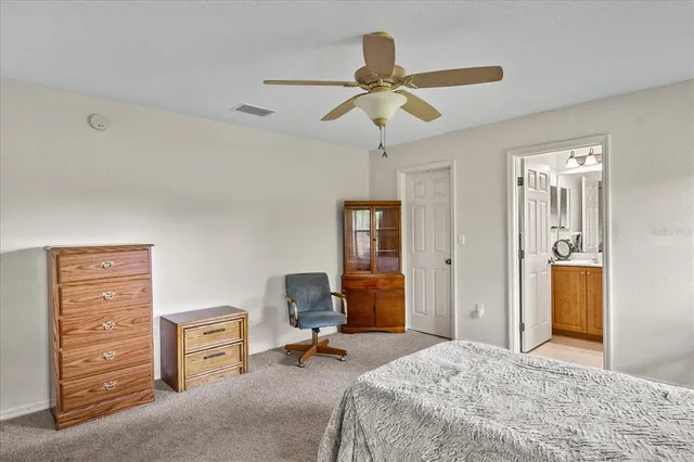 a bedroom with a bed and furniture