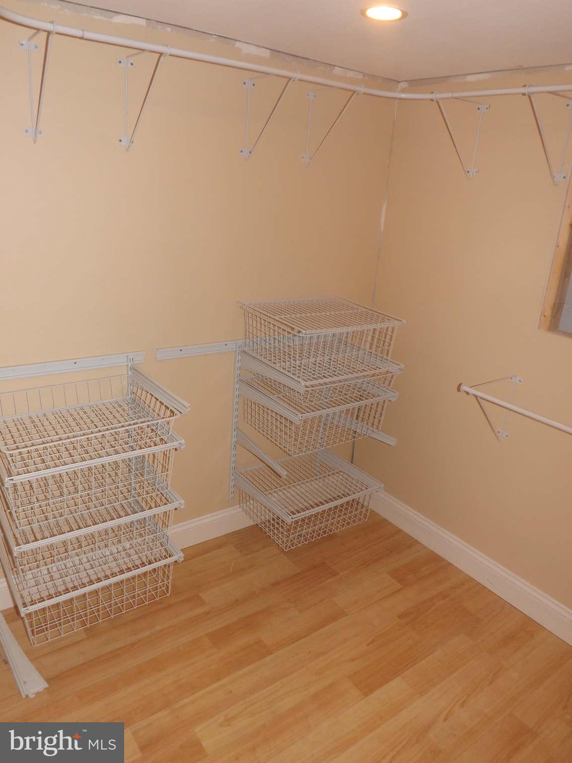 60 Cox Road Huntingtown, MD 20639 - Photo 10 of 15 a view of a room with racks on the wall