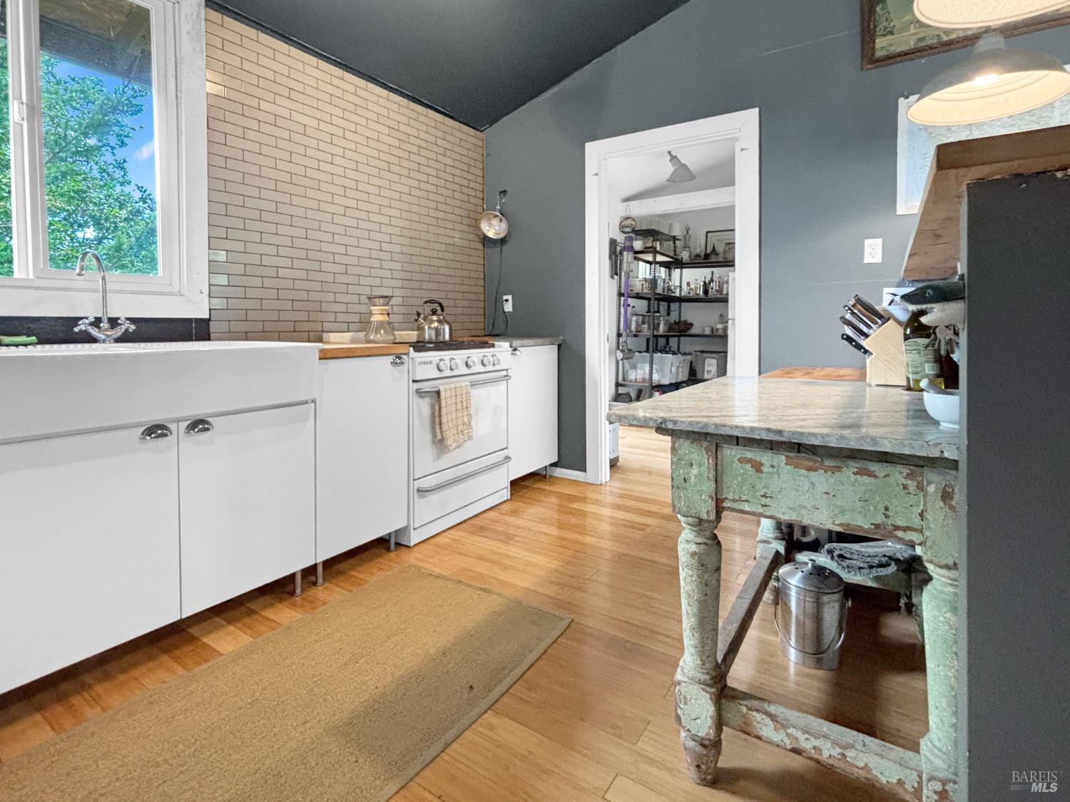56801 Registered Guest Road Laytonville, CA 95454 - Photo 17 of 22 a kitchen with a sink cabinets and window