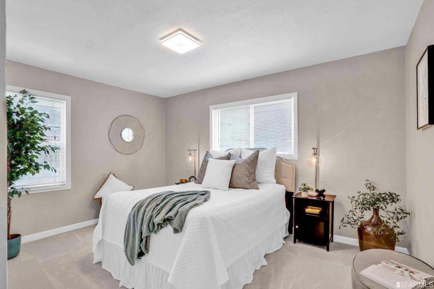 476 Violet Street San Leandro, CA 94578 - Photo 17 of 30 a bedroom with a bed and a window