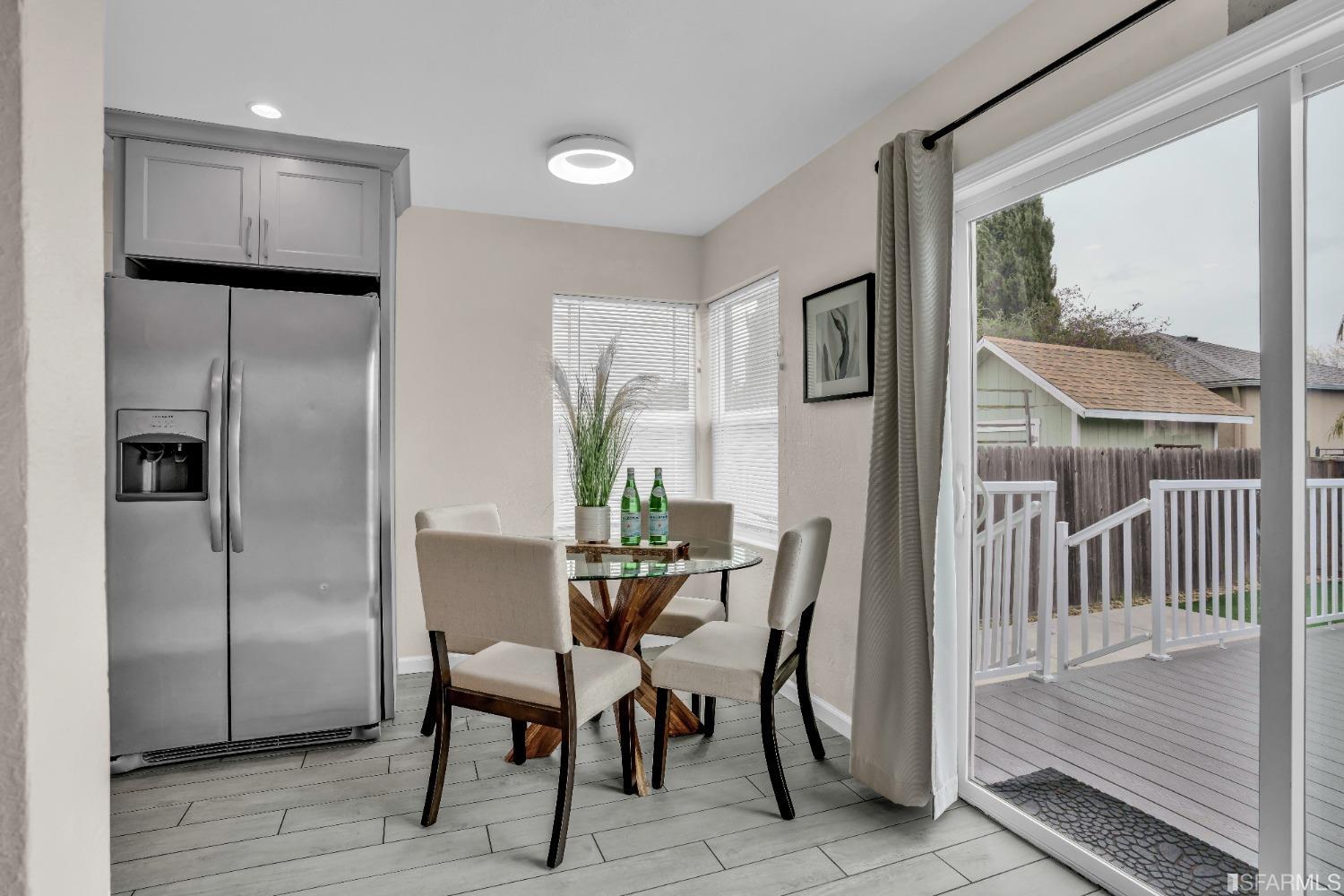 476 Violet Street San Leandro, CA 94578 - Photo 6 of 30 a view of a dining room with furniture and wooden floor