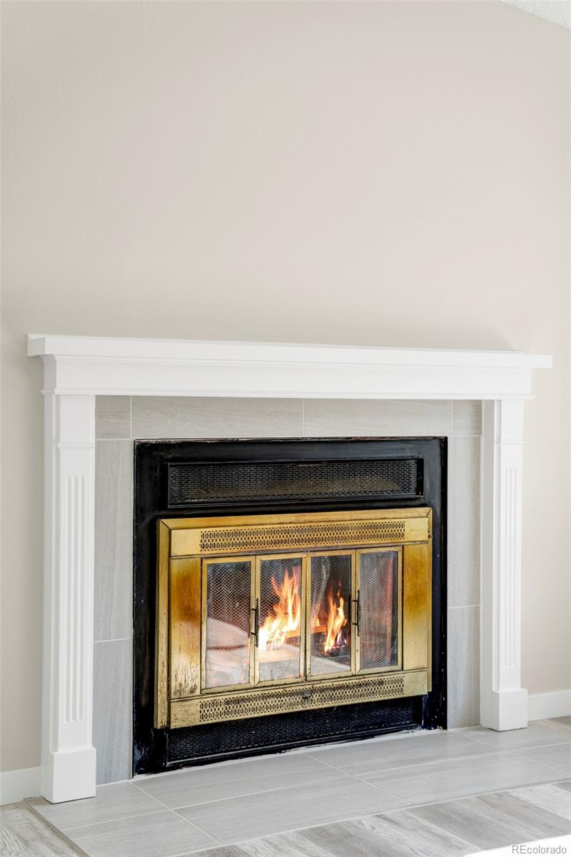 4345 Eagle Street Denver, CO 80239 - Photo 7 of 20 a view of a fireplace