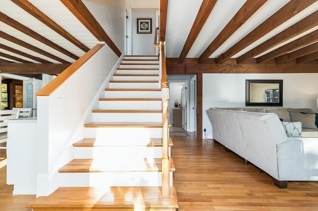 28 Macomber Road Gloucester, MA 01930 - Photo 23 of 40 a view of entryway and hall with wooden floor